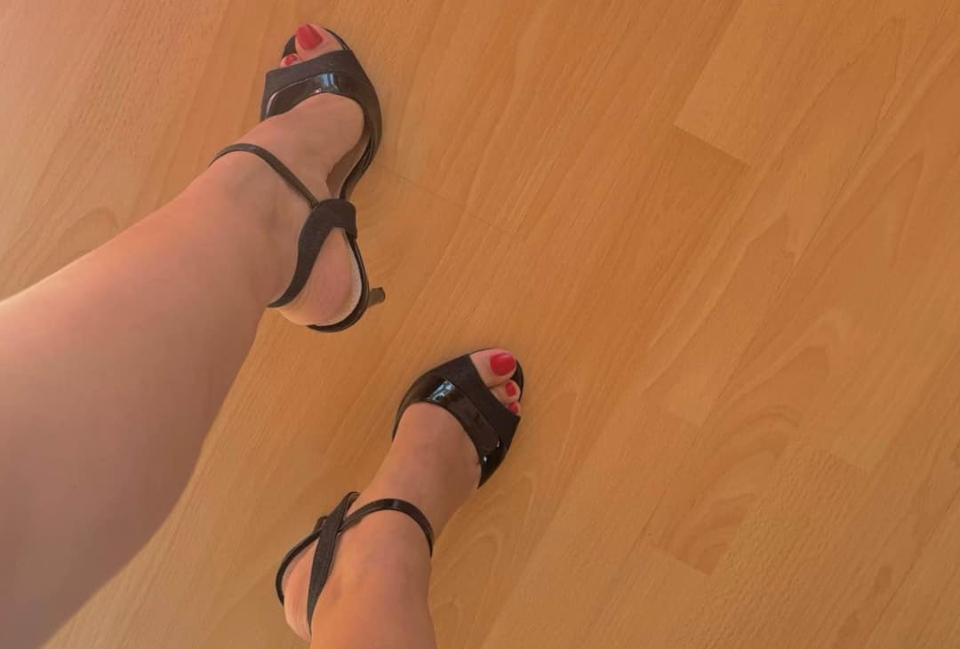 Red Toenails in black High Heels ? ?