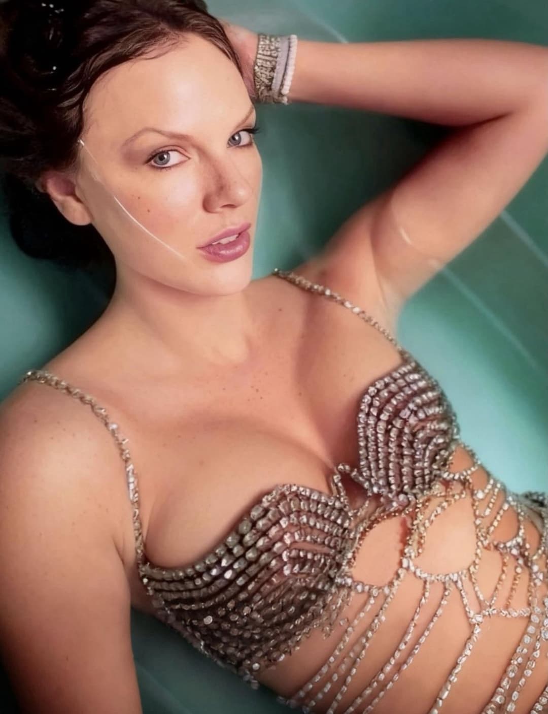 Taylor Swift showing off her body in Life of a Showgirl promo material