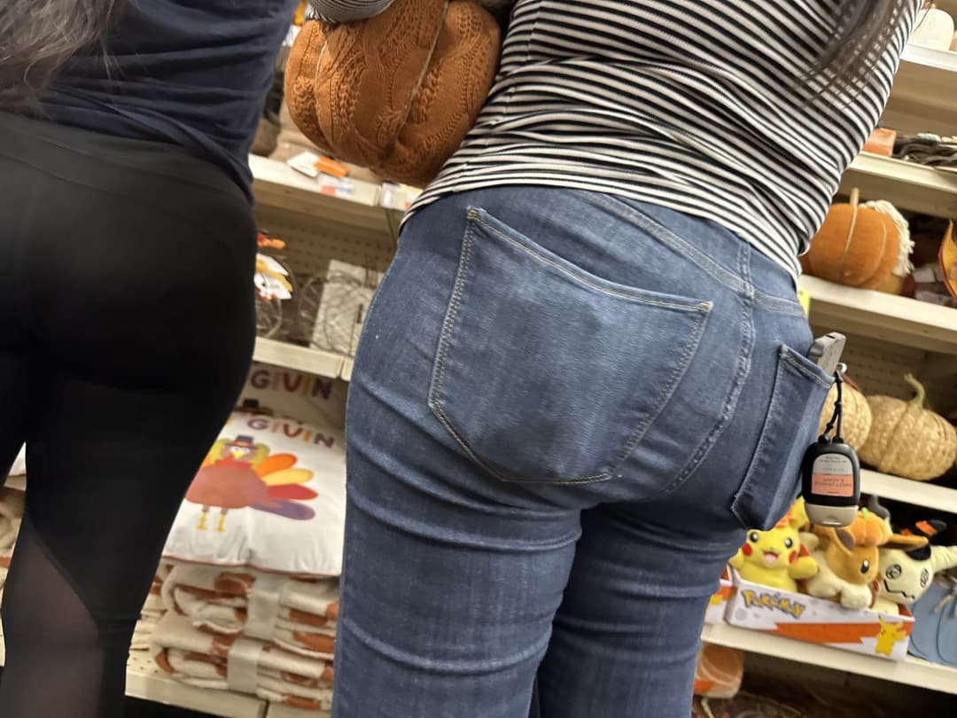 Mother in blue jeans  & Daughter in black tights.