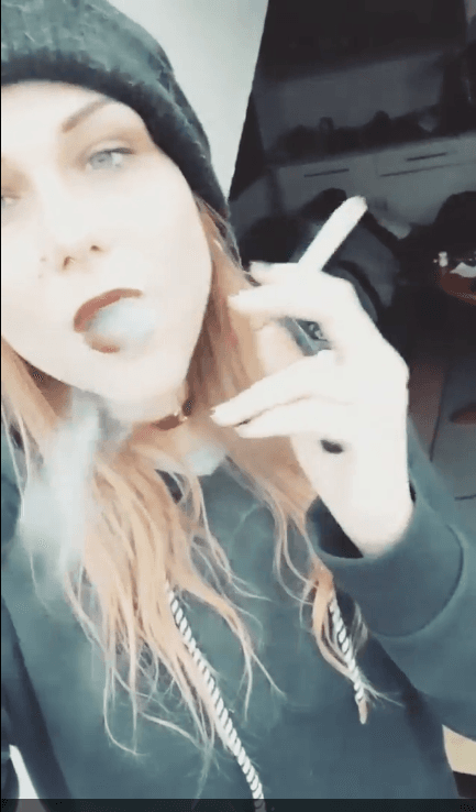 smoking hot emo hipster goth girl fucks the guys in the band. I love when women smile and smoke.