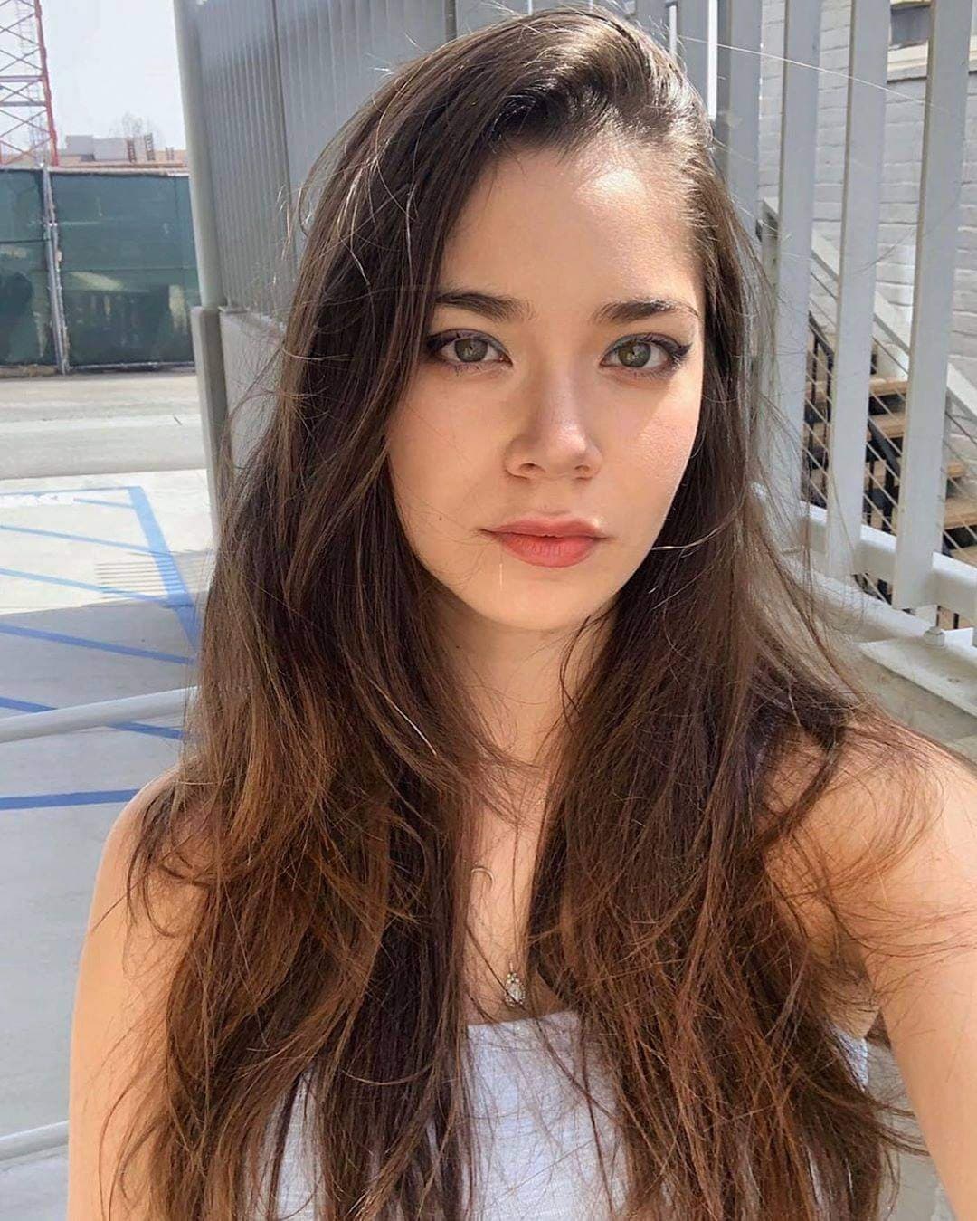 Mixed German-Korean model MELODI FLACK deserves your baby oil covering her pretty face