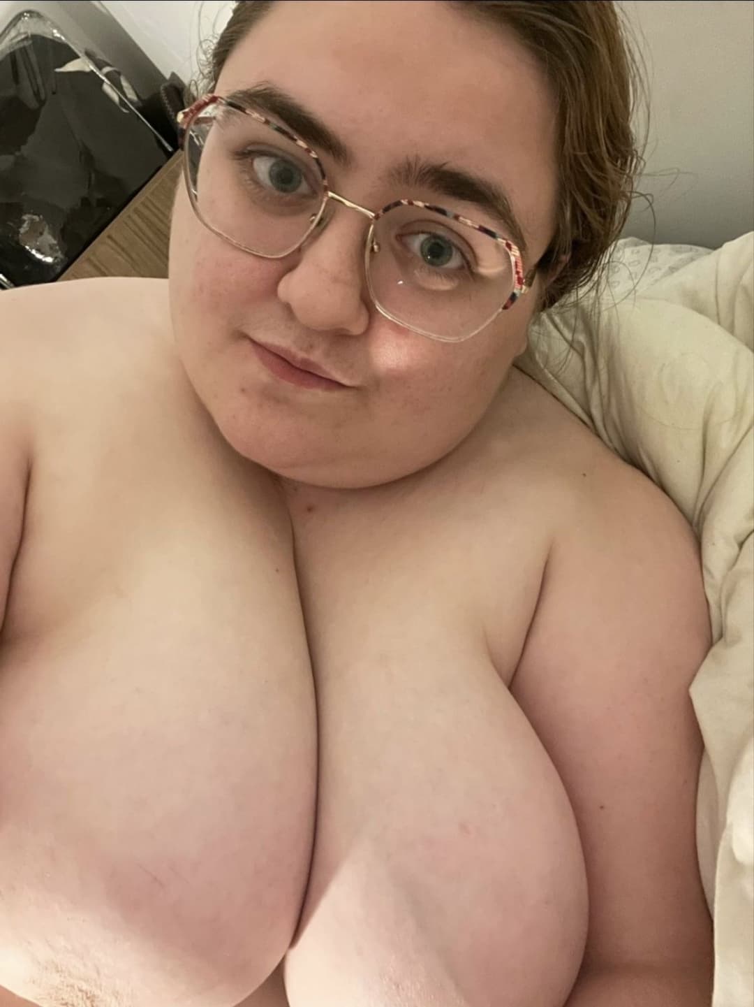 Husband shares his wife’s big tits