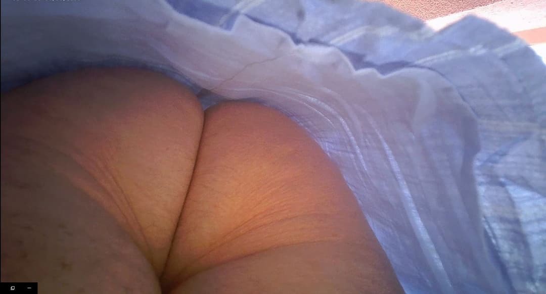 Cheating mature nurse Solange upskirted panty or pantyless