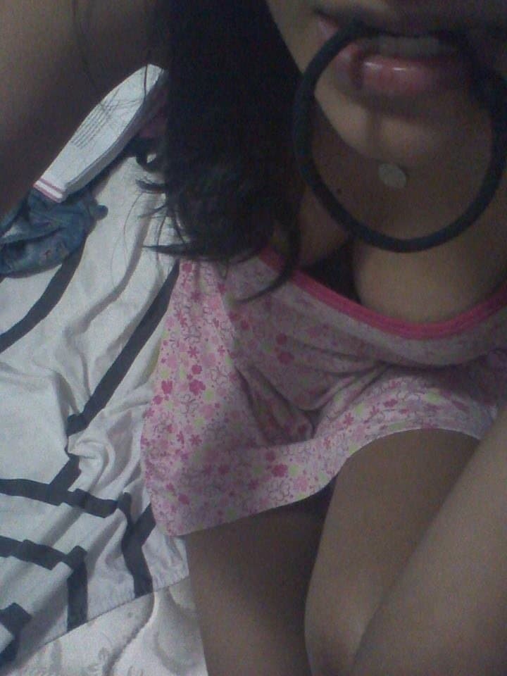 Brunette slut fake tits pretty smile