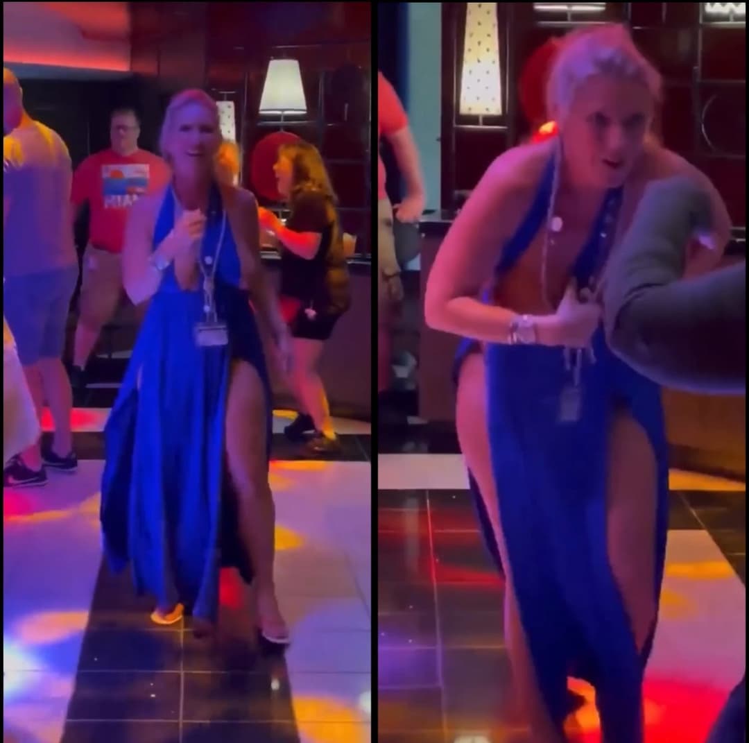Work manager’s big tits fall out of dress at work party