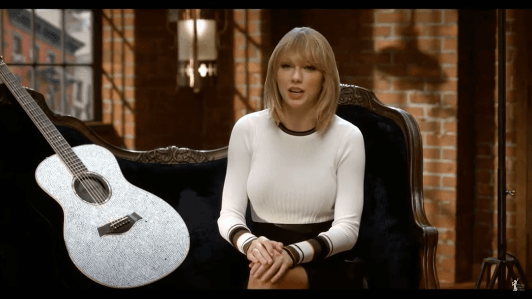 Taylor Swift tight white sweater, leather skirt, leather heels