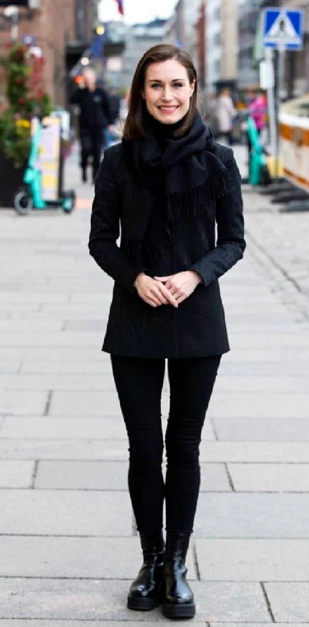 Finnish prime minister Sanna Marin.  Petite Elegant lady hinding a sex freak party chic within