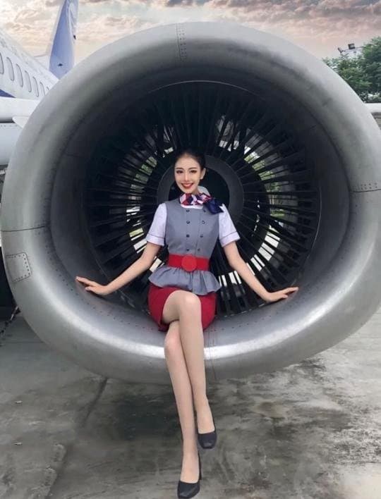 Very sexy air stewardess in uniform, and after facial.
