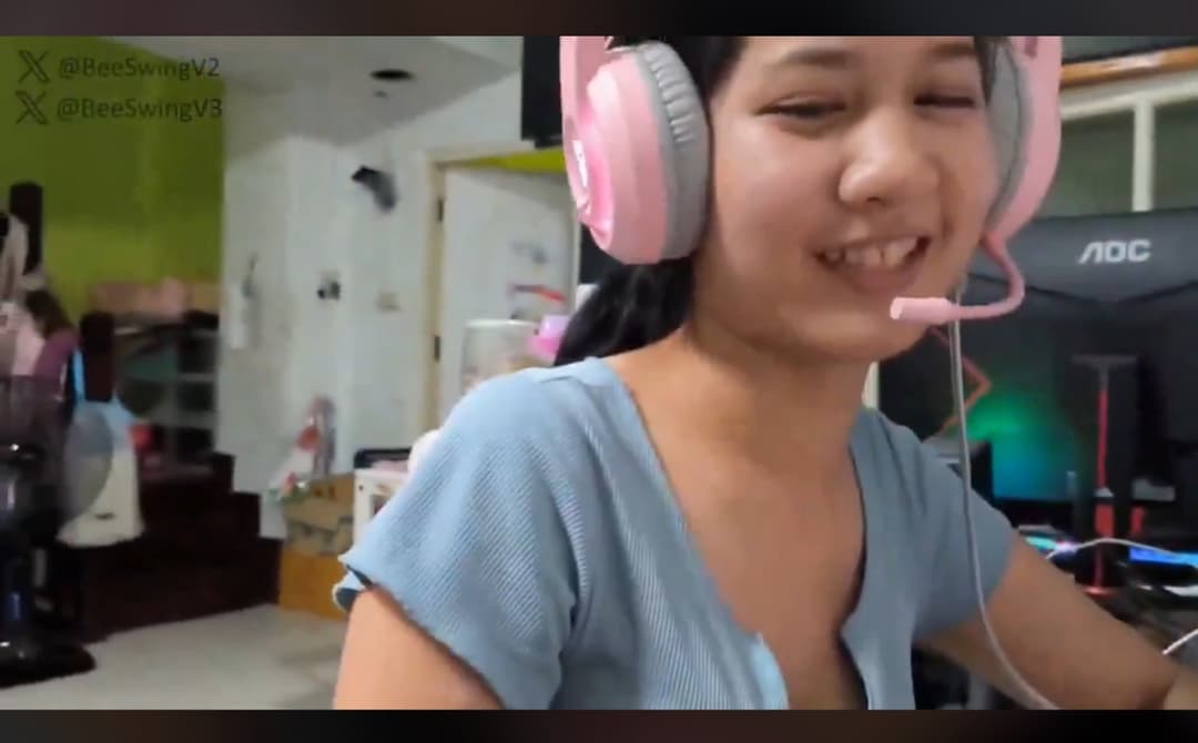 Cute Thai gamer girl doing side quest with her boyfriend