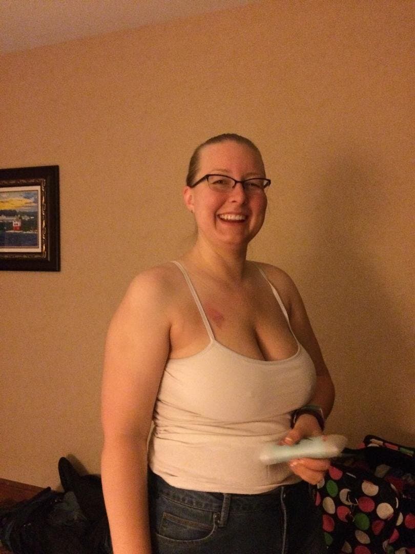 Blonde showing off her bare tits