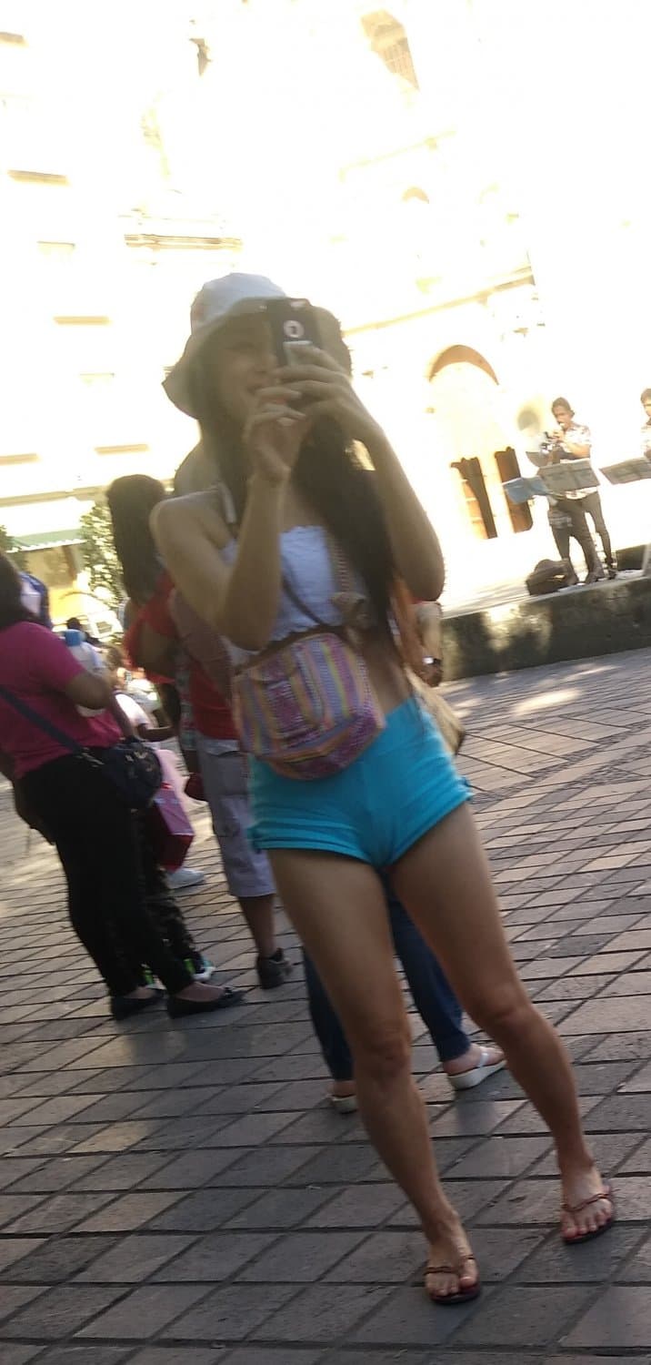 Skinny girl, showing a little peach