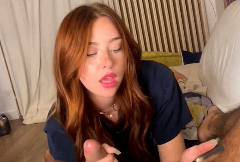 Click to view full size Cute redhead teen scroll on internet while she sucks BF