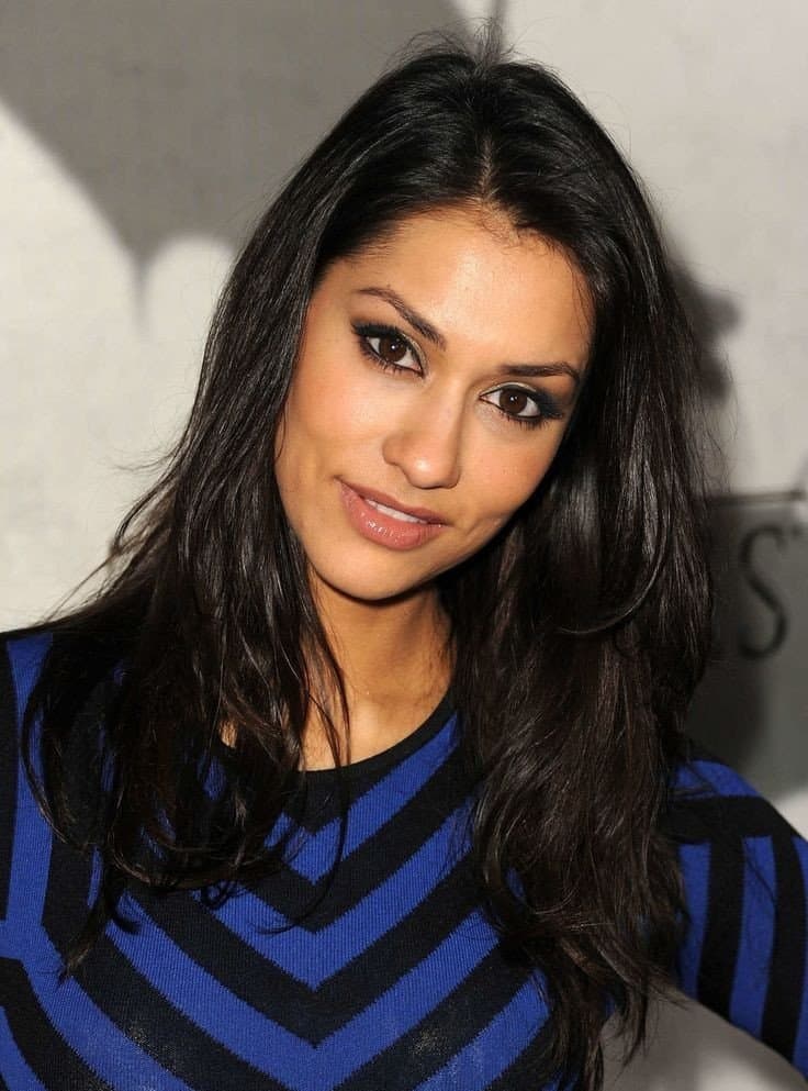 Submit to your goddess Janina Gavankar. Lose yourself in her bedroom eyes and sultry body