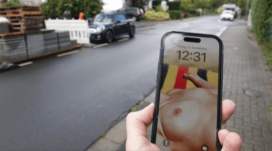 Stranger using my naked wife as his phone wallpaper in public