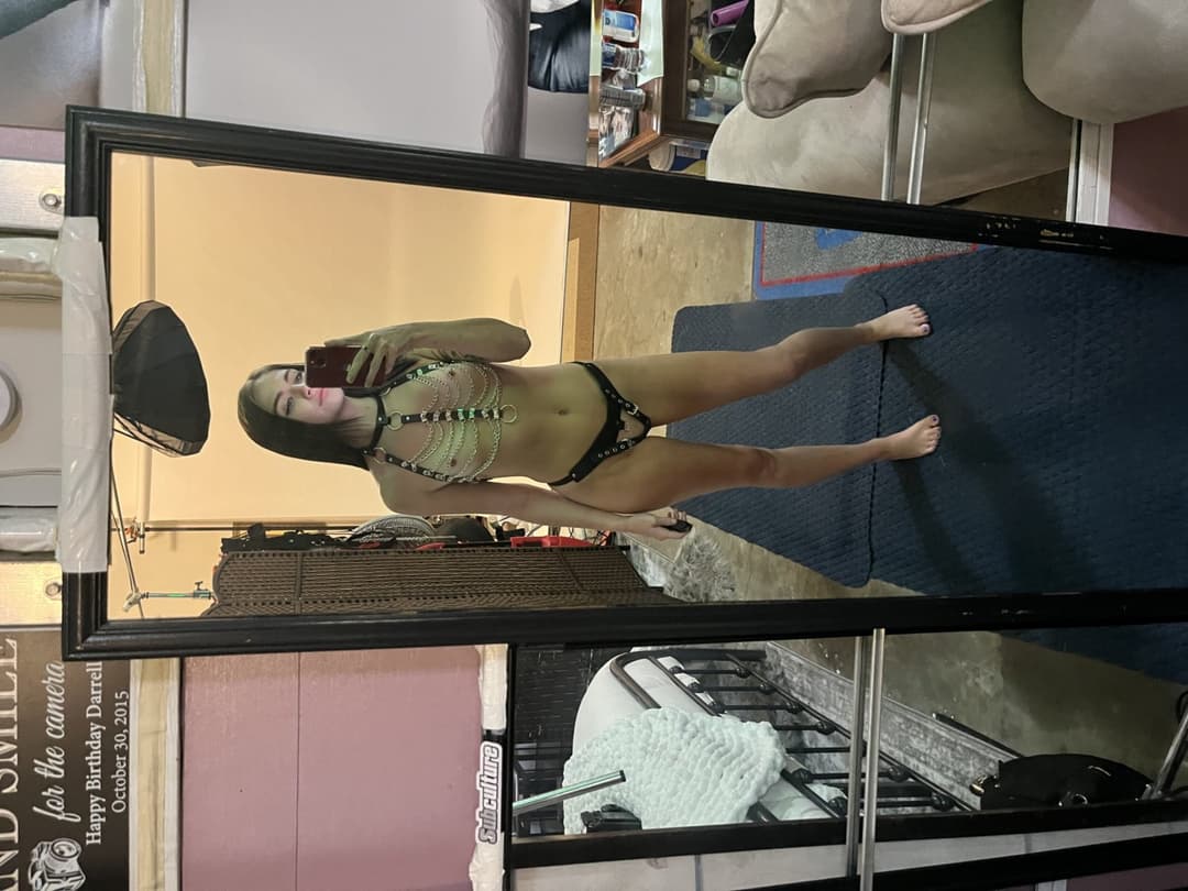 Sexy brunette with tattoos and pierced nipples