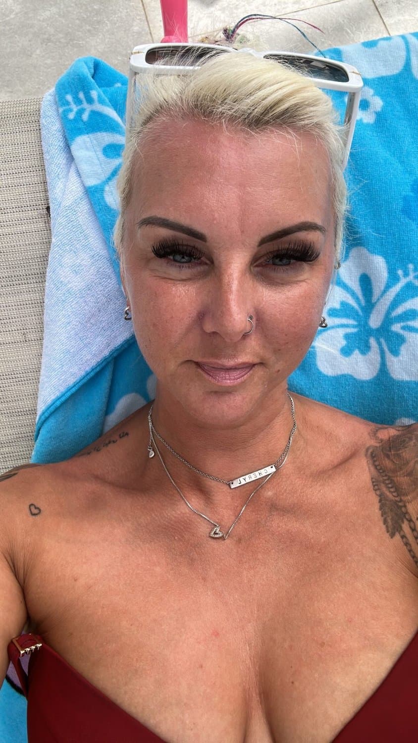 Milf from the UK - Curvaceous, tattooed and a delicious smile.