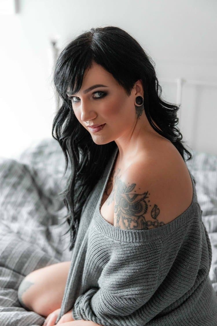 Tatted busty black hair beauty boudoir