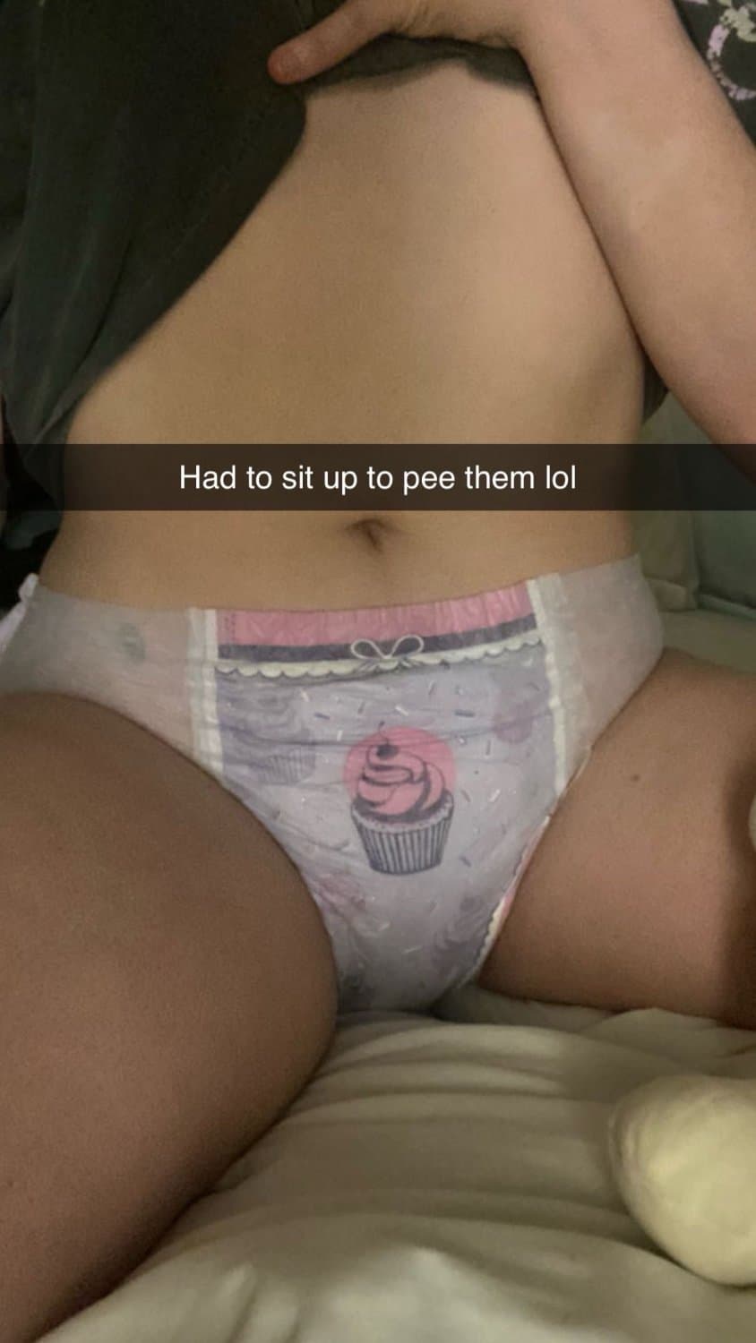 Click to view full size Cute redhead wears diapers for “anxiety”