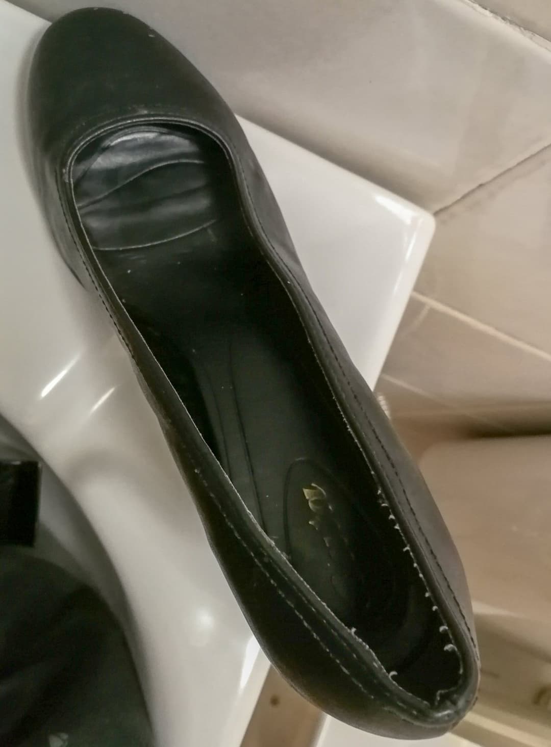 Emptying cum into shoes