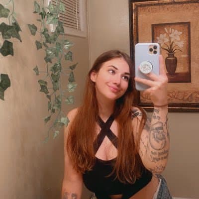 Click to view full size Hottest Milf ever? This curvy slut who loves sticking her tongue out comes damn close