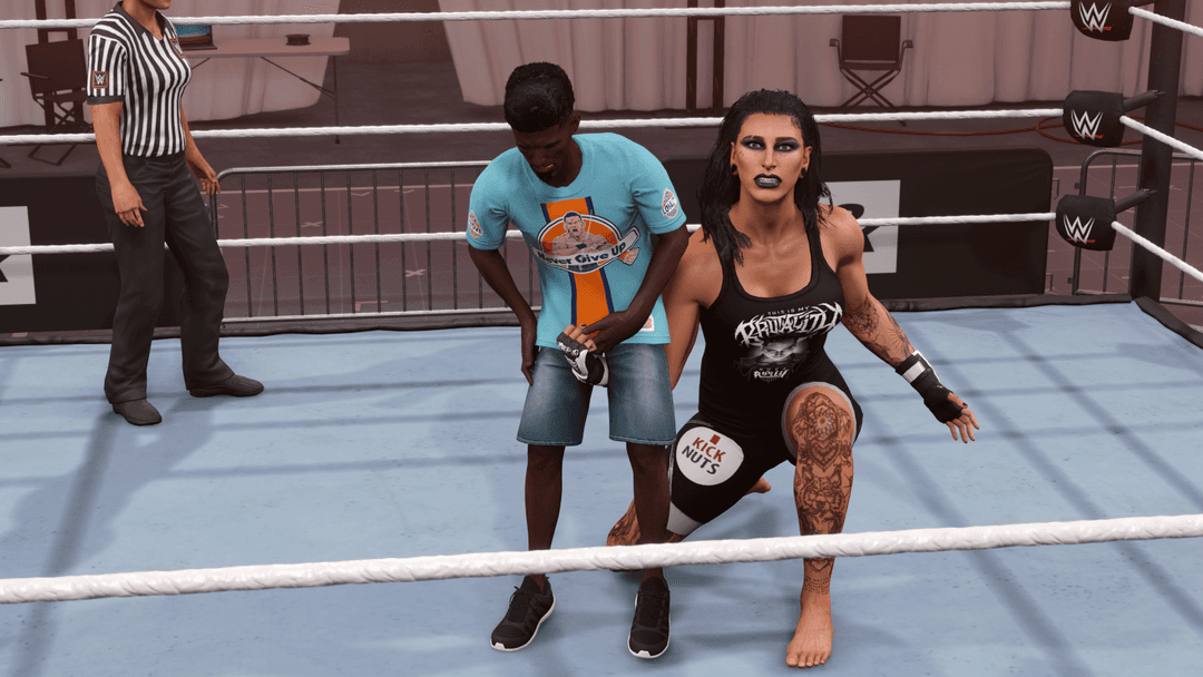 Giant Rhea Ripley Ballbusting