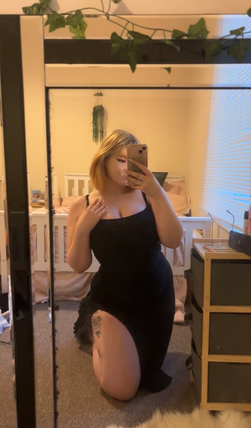 Tell me how good you think I look in this black dress