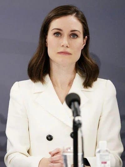 Finnish prime minister Sanna Marin.  Petite Elegant lady hinding a sex freak party chic within
