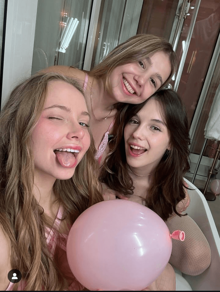 sexy teen girls playing with balloons
