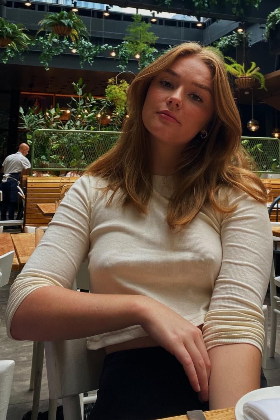 Some busty pierced braless woman ???