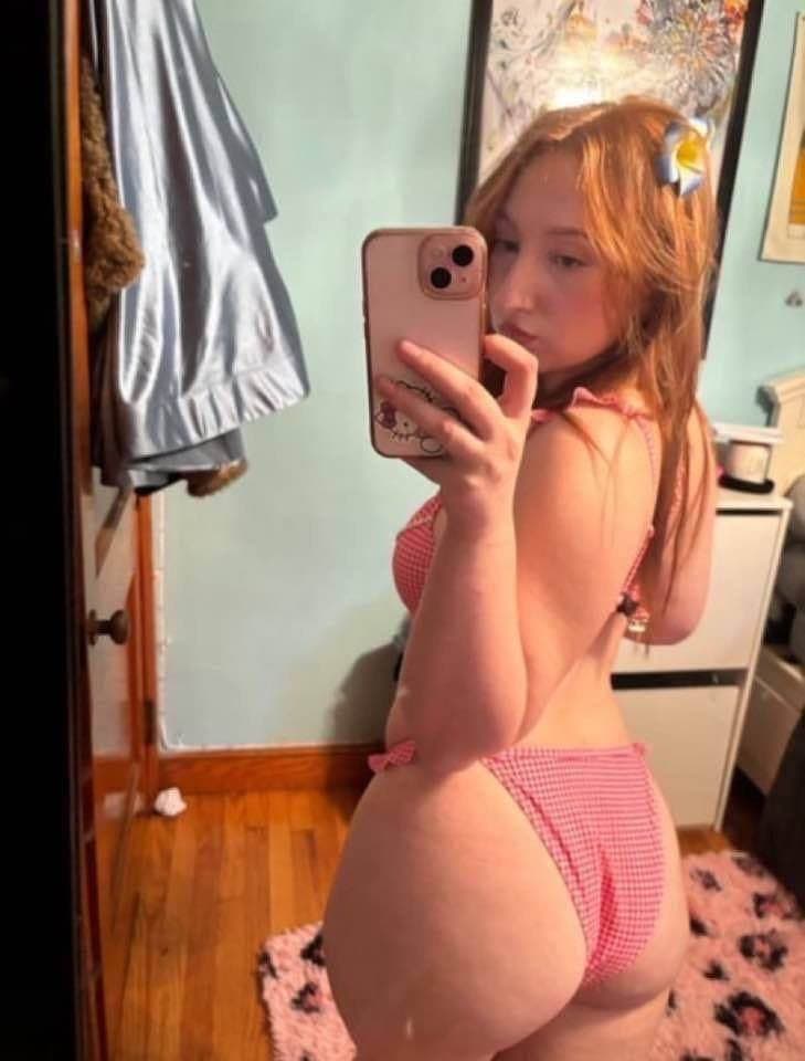 Click to view full size Slutty red head loves showing off her perfect ass
