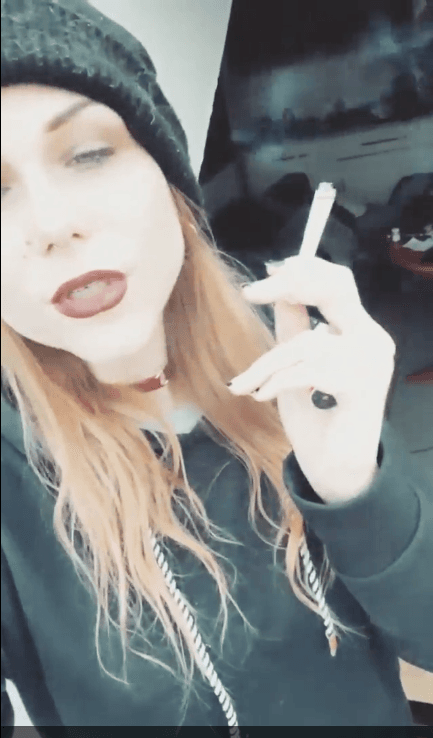 smoking hot emo hipster goth girl fucks the guys in the band. I love when women smile and smoke.