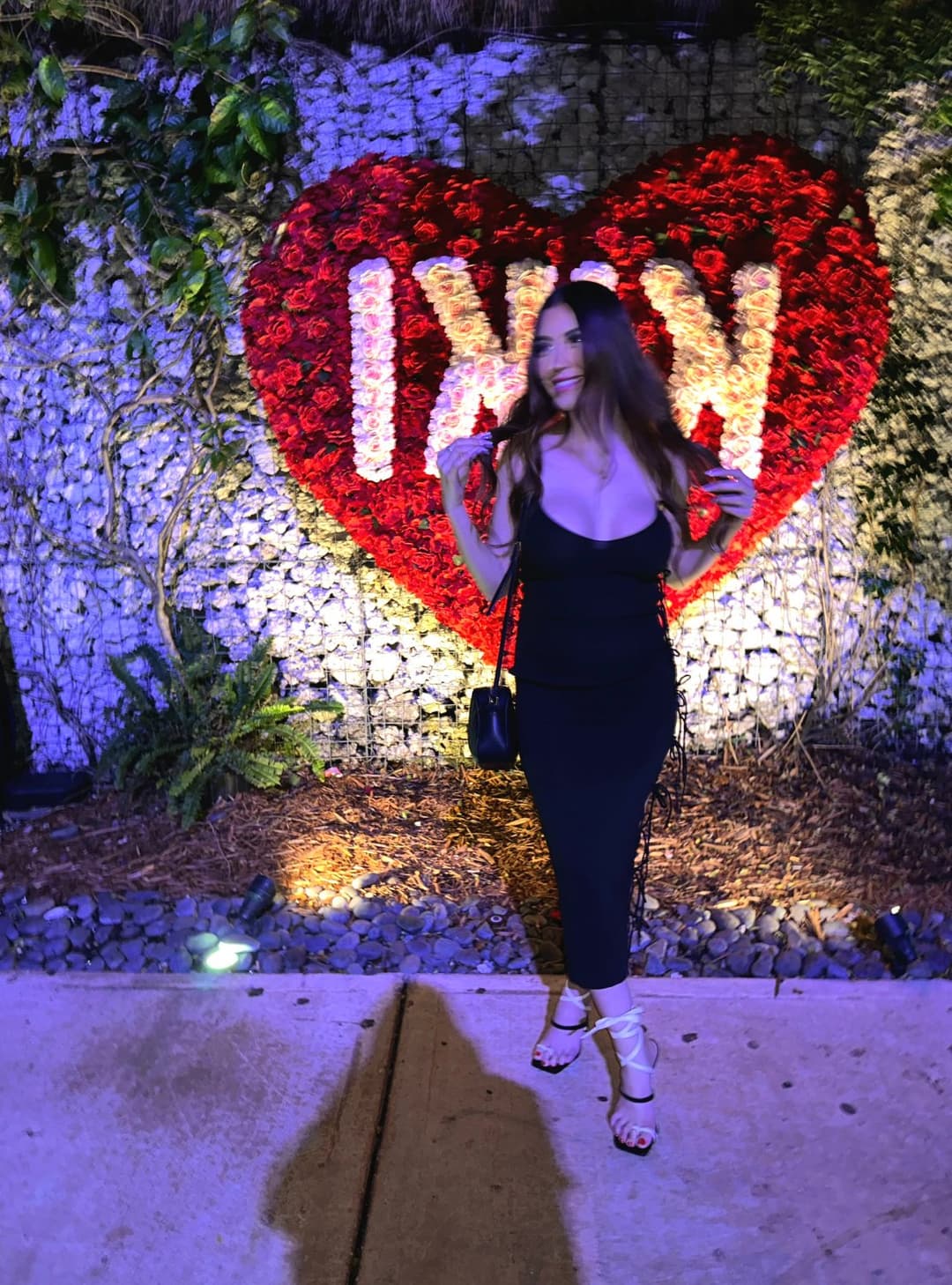 Sexy chick in a black dress is all you need tonight