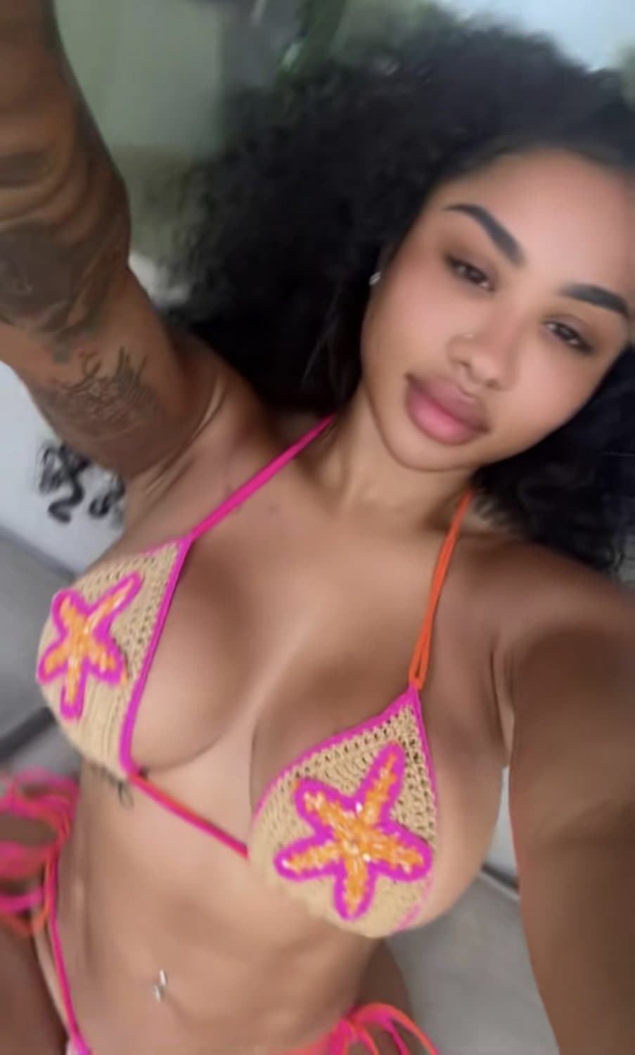 ari fletcher tits busting out bikinis