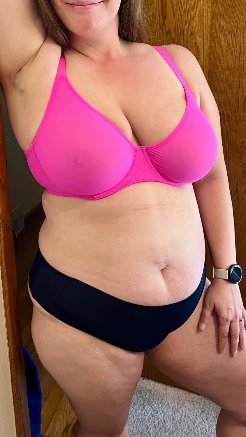 BBW milf stuffing big tits in new bras