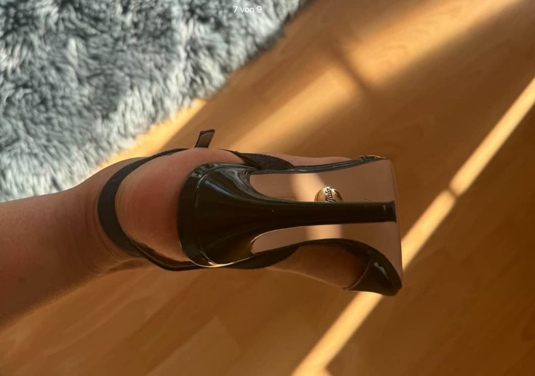 Red Toenails in black High Heels ? ?