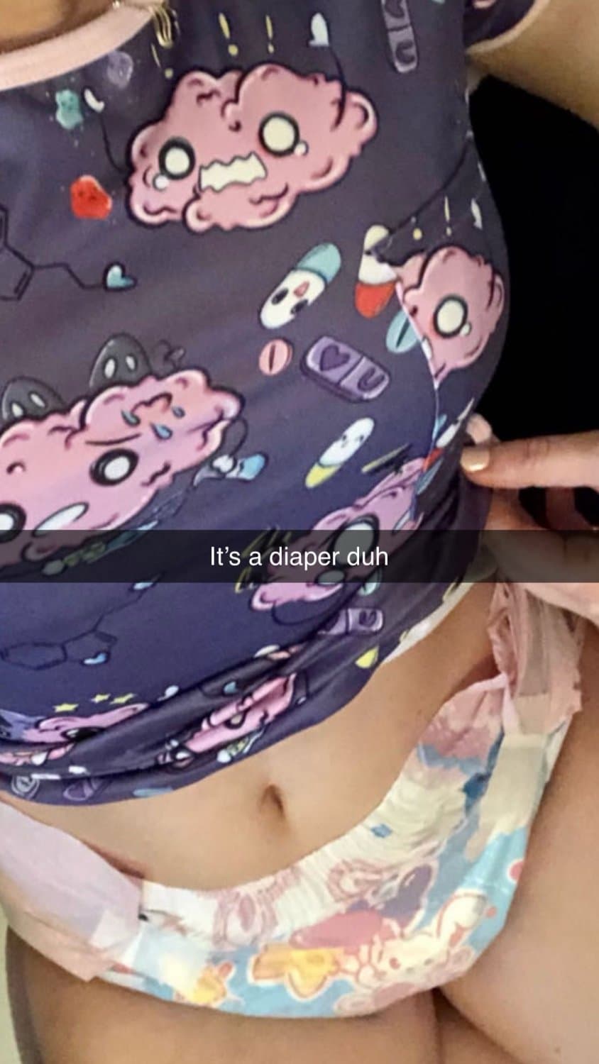 Hot blonde teen in diapers