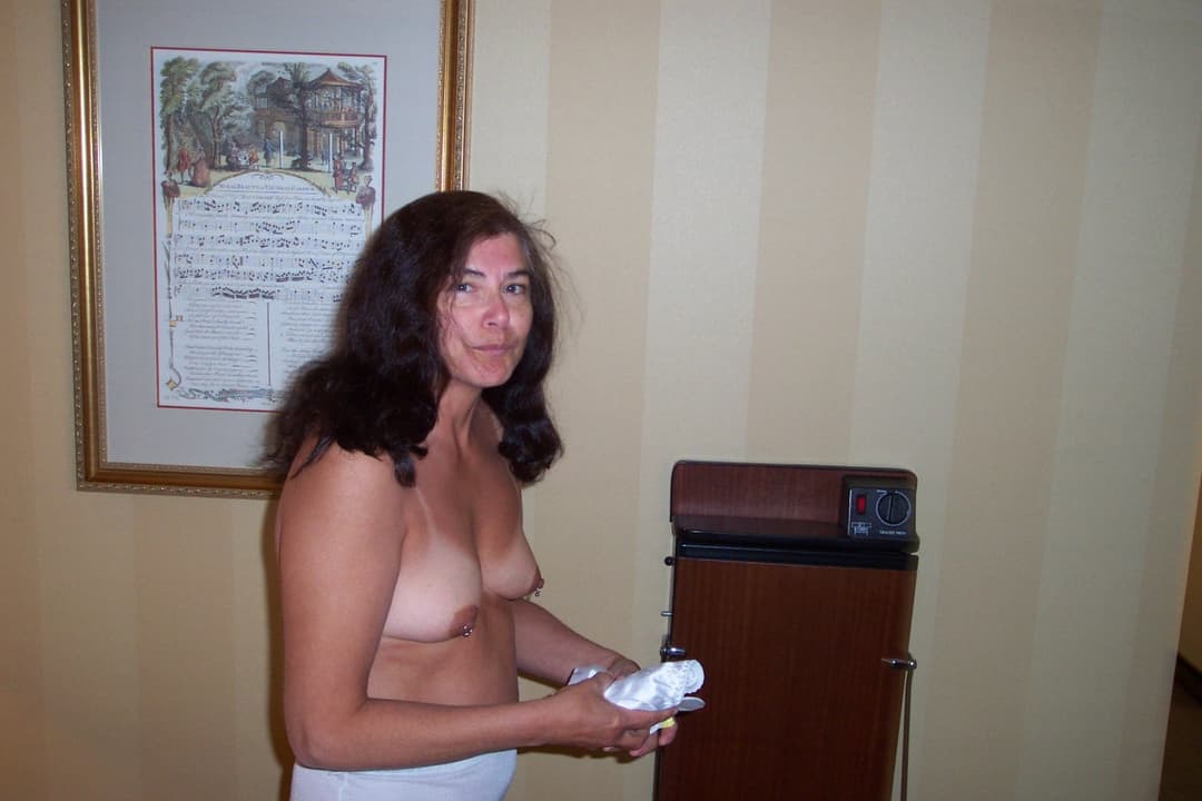 Marilyn enjoys being totally nude for you to see her body.