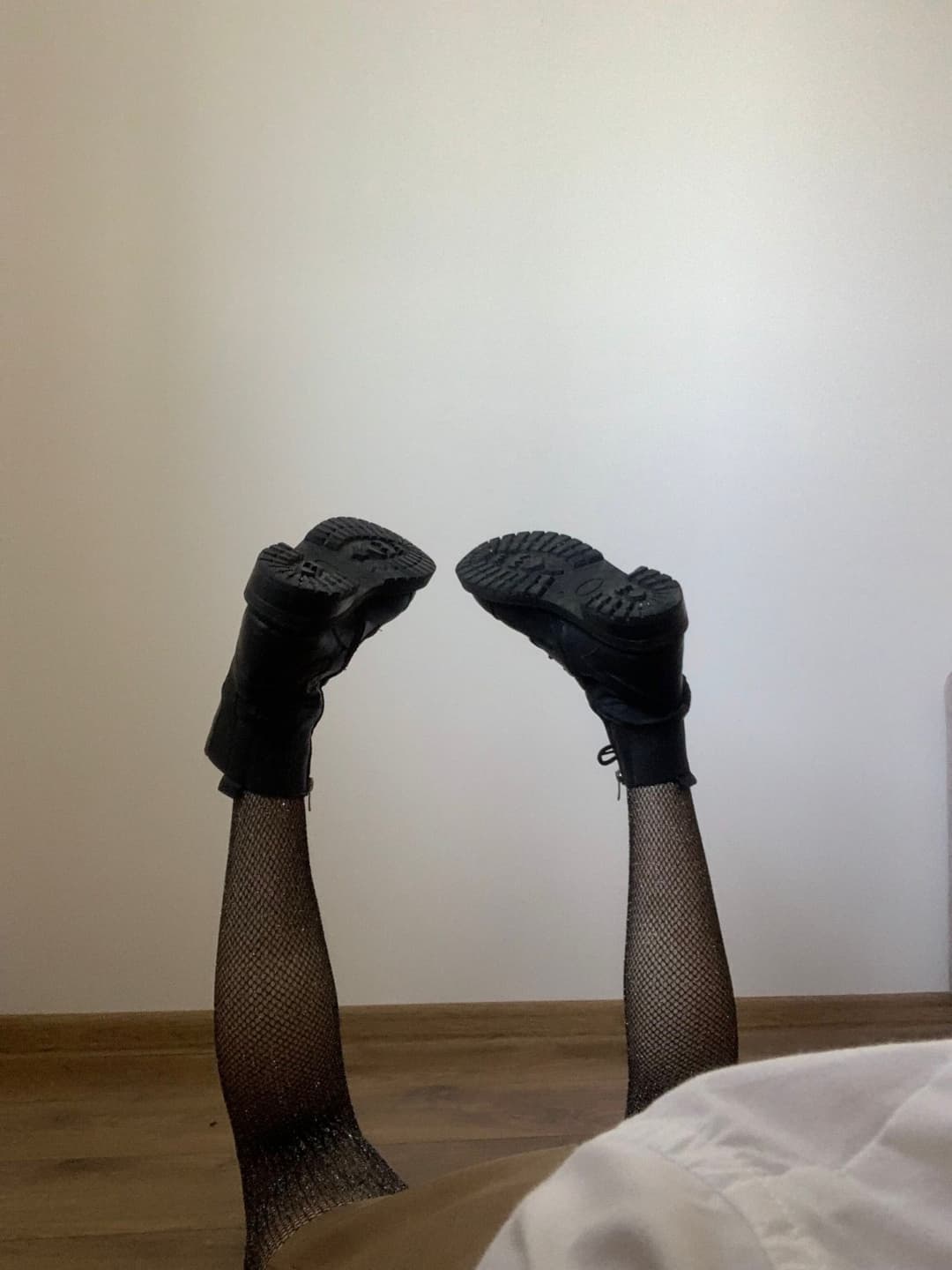 Kate Sissy Cl1412 showing her in leather skirt and fishnets