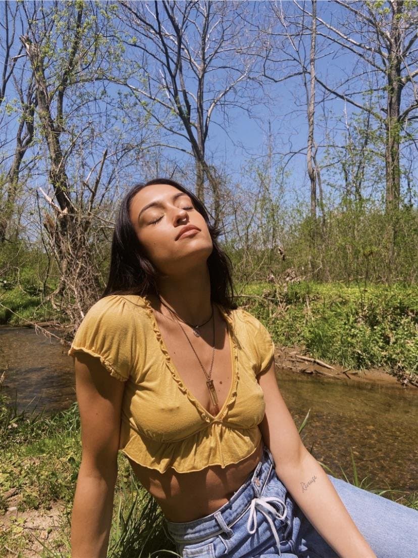 Some busty pierced braless woman ???