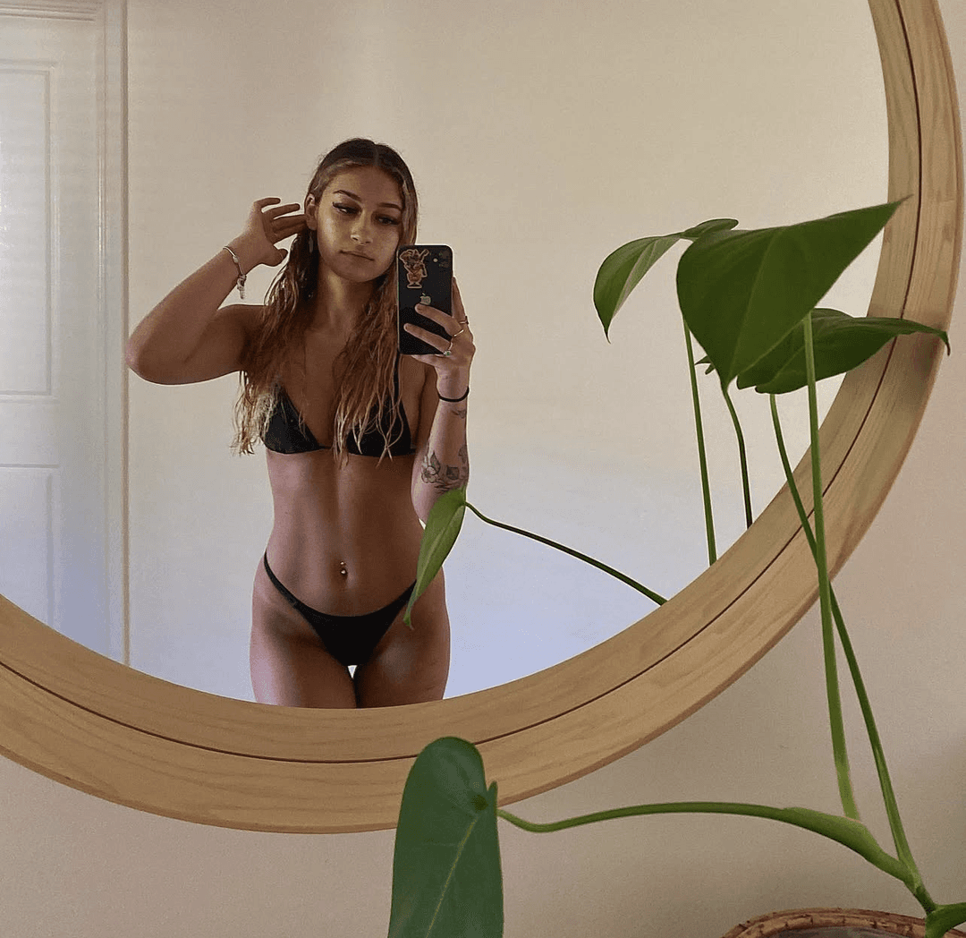 From party to the beach. To show off that slutty ass