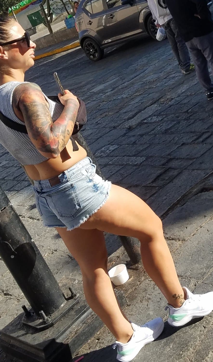 Nice legs and a little peach showing, shorts