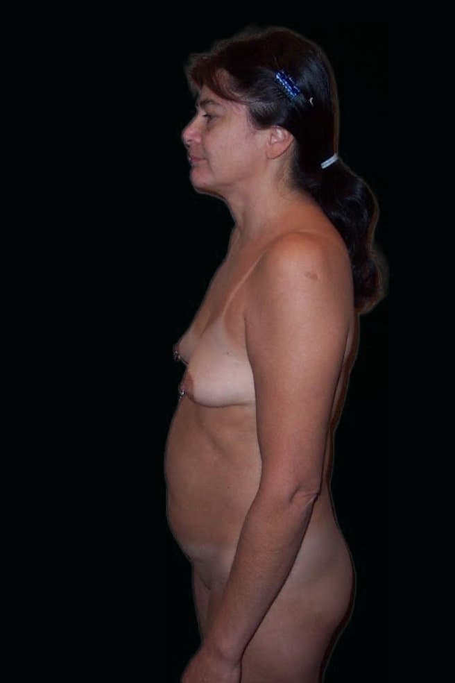 Marilyn enjoys being totally nude for you to see her body.