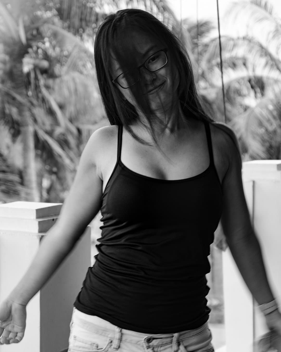 Cute Hongkong girl in glasses giving blowjob