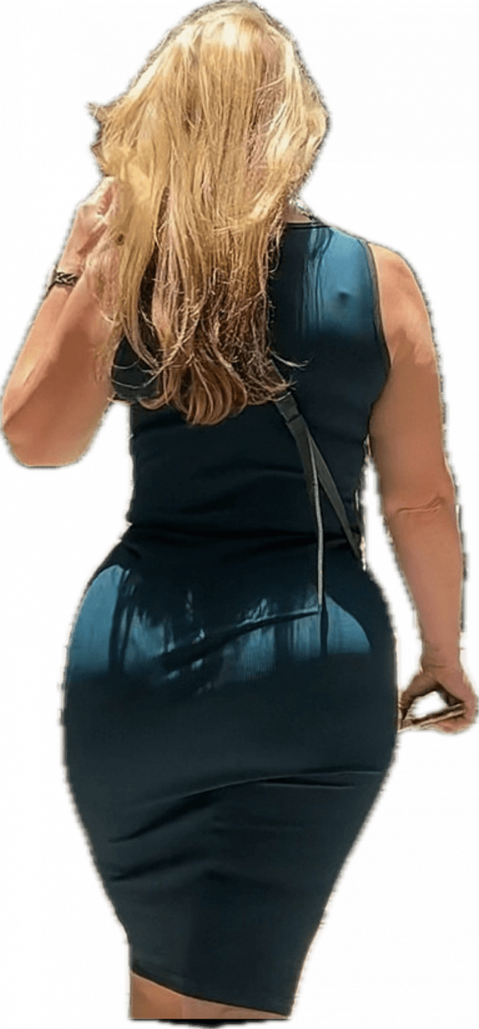 curvy blonde hourglass shaped milf in tight green dress