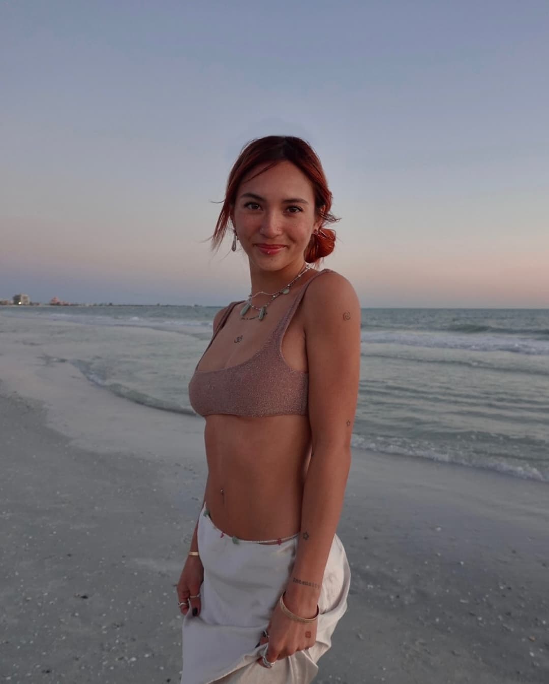 Photo shared by ★CLOUDSWORLD★ on March 14, 2025 tagging @zachdaye.May be an image of 1 person, miniskirt, fishnet stockings, outdoors and text