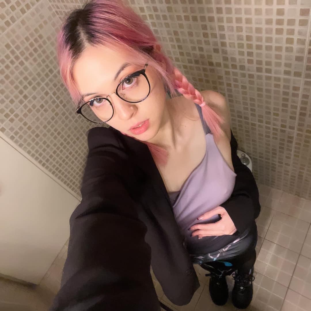 Azul is a sexy tattooed slut. Do you prefer her pink or brunette hair?