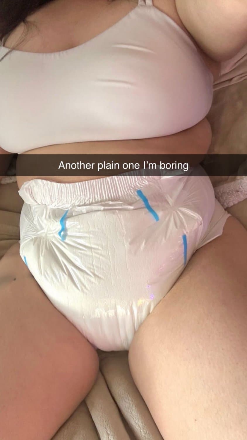 Click to view full size Incontinent college girl doesn’t mind showing off her diapers