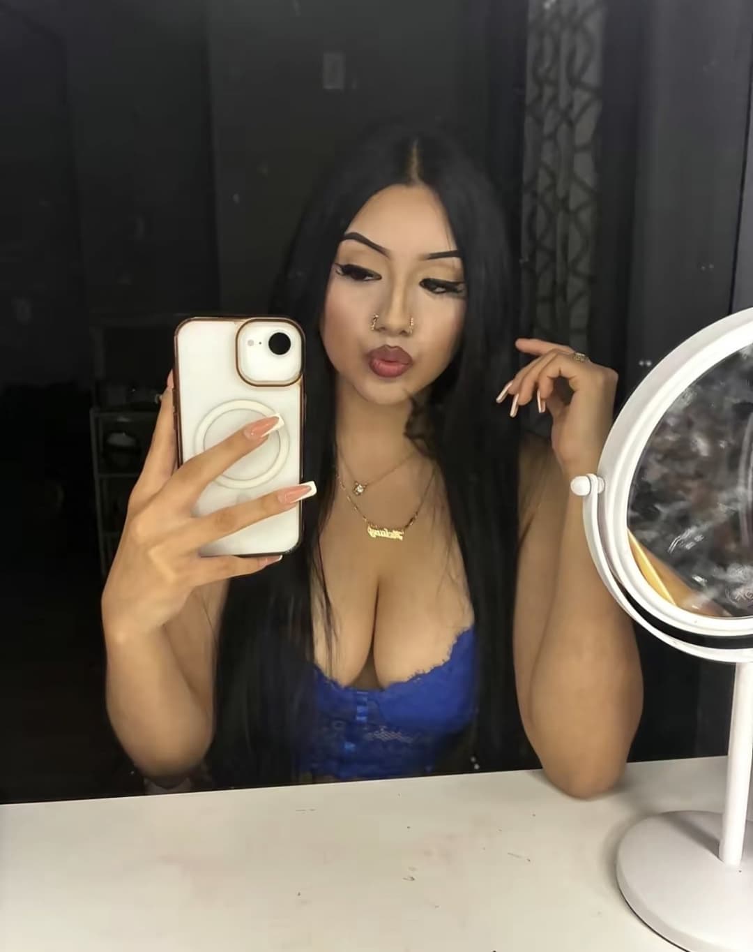 Sexy Latina showing off her costumes