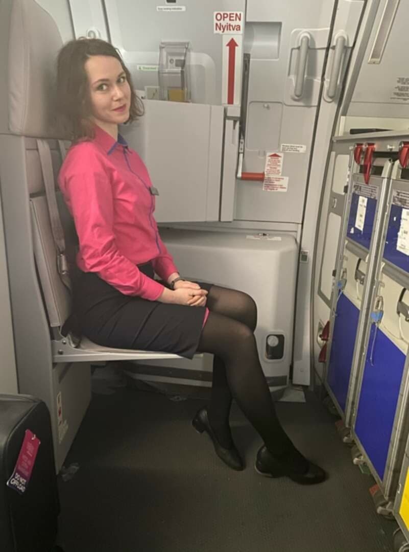 Horny flight attendant knows her charms