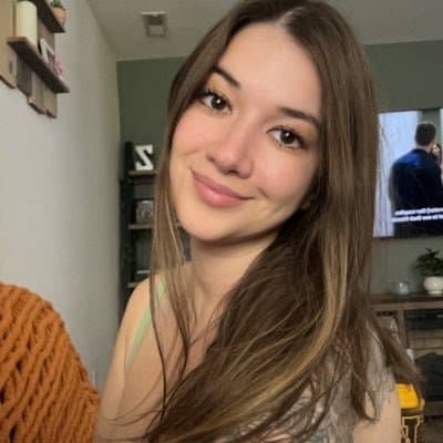 Click to view full size Hottest Milf ever? This curvy slut who loves sticking her tongue out comes damn close